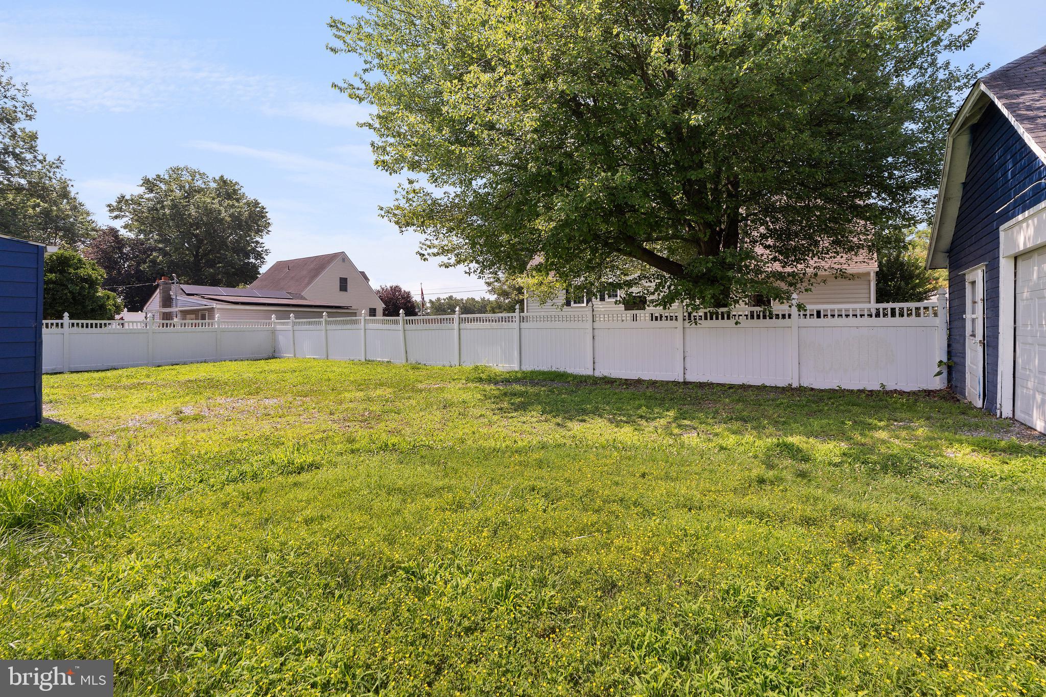 109 Georgia Road Pennsville, NJ 08070 - Photo 40 of 40 a view of a swimming pool with an outdoor space and seating area