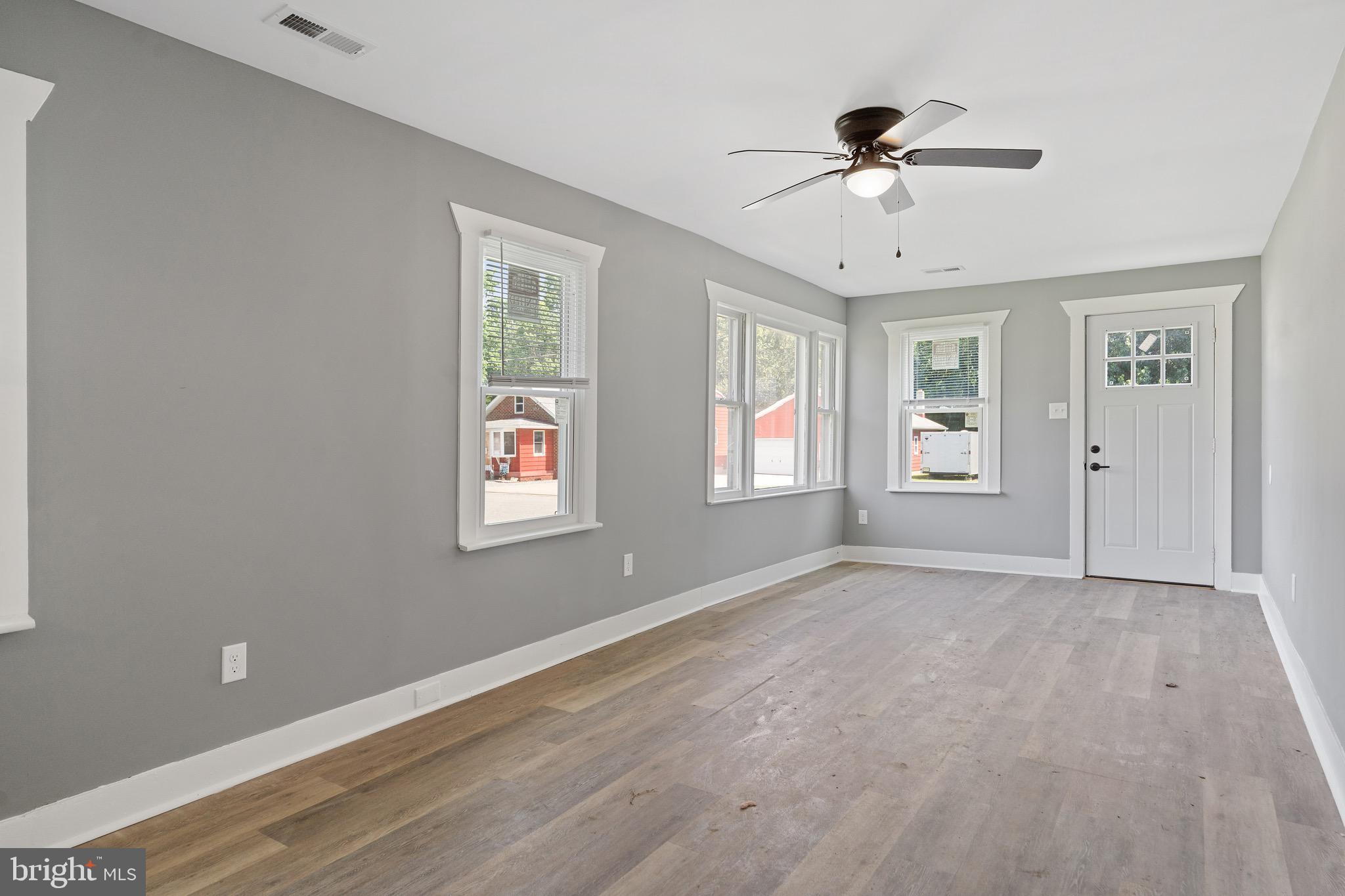 109 Georgia Road Pennsville, NJ 08070 - Photo 8 of 40 a view of an empty room with a window