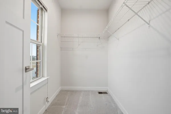 a view of small space with racks on the wall