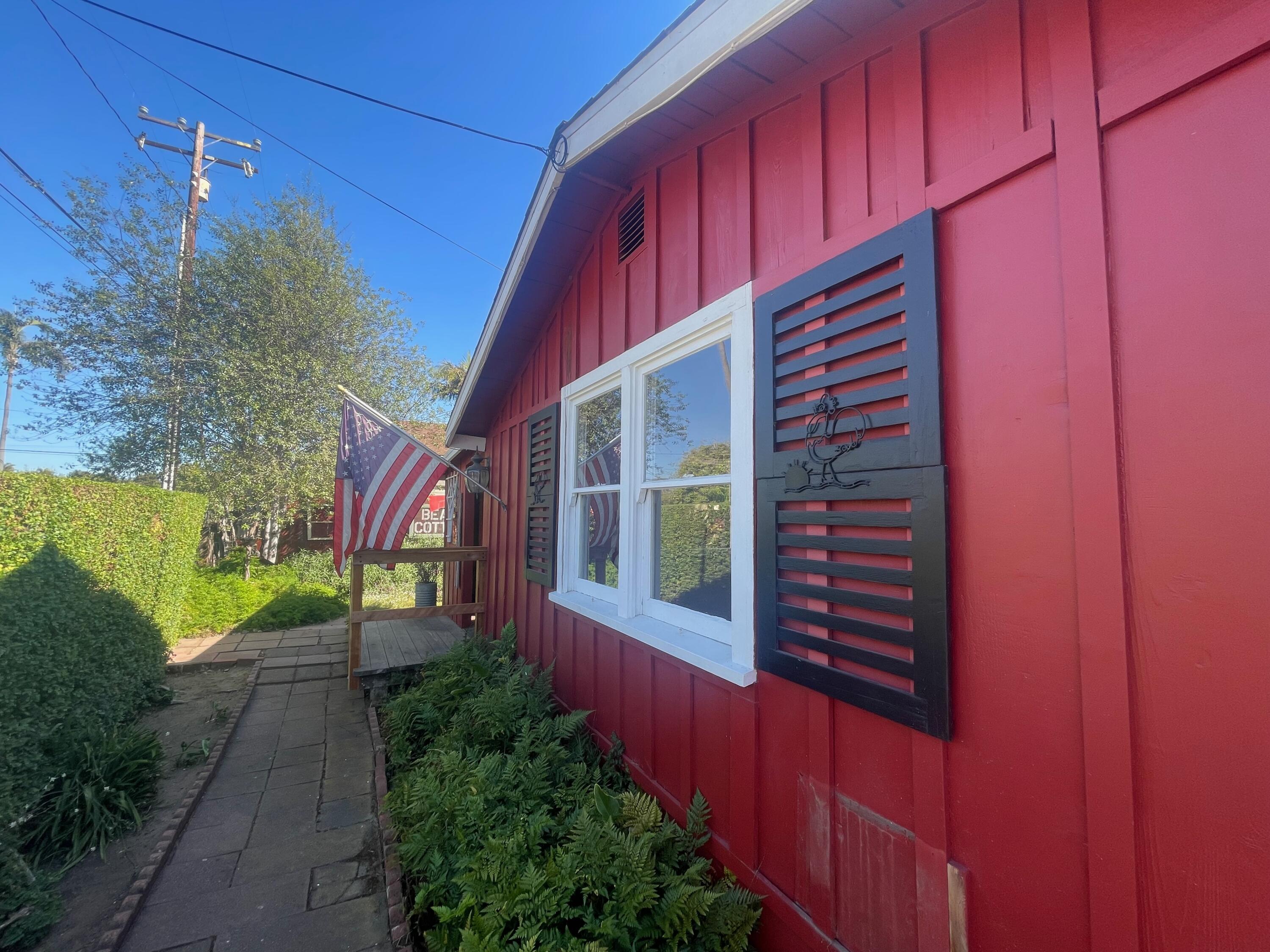 5161 6th Street Carpinteria, CA 93013 - Photo 1 of 27 a view of a house with a yard