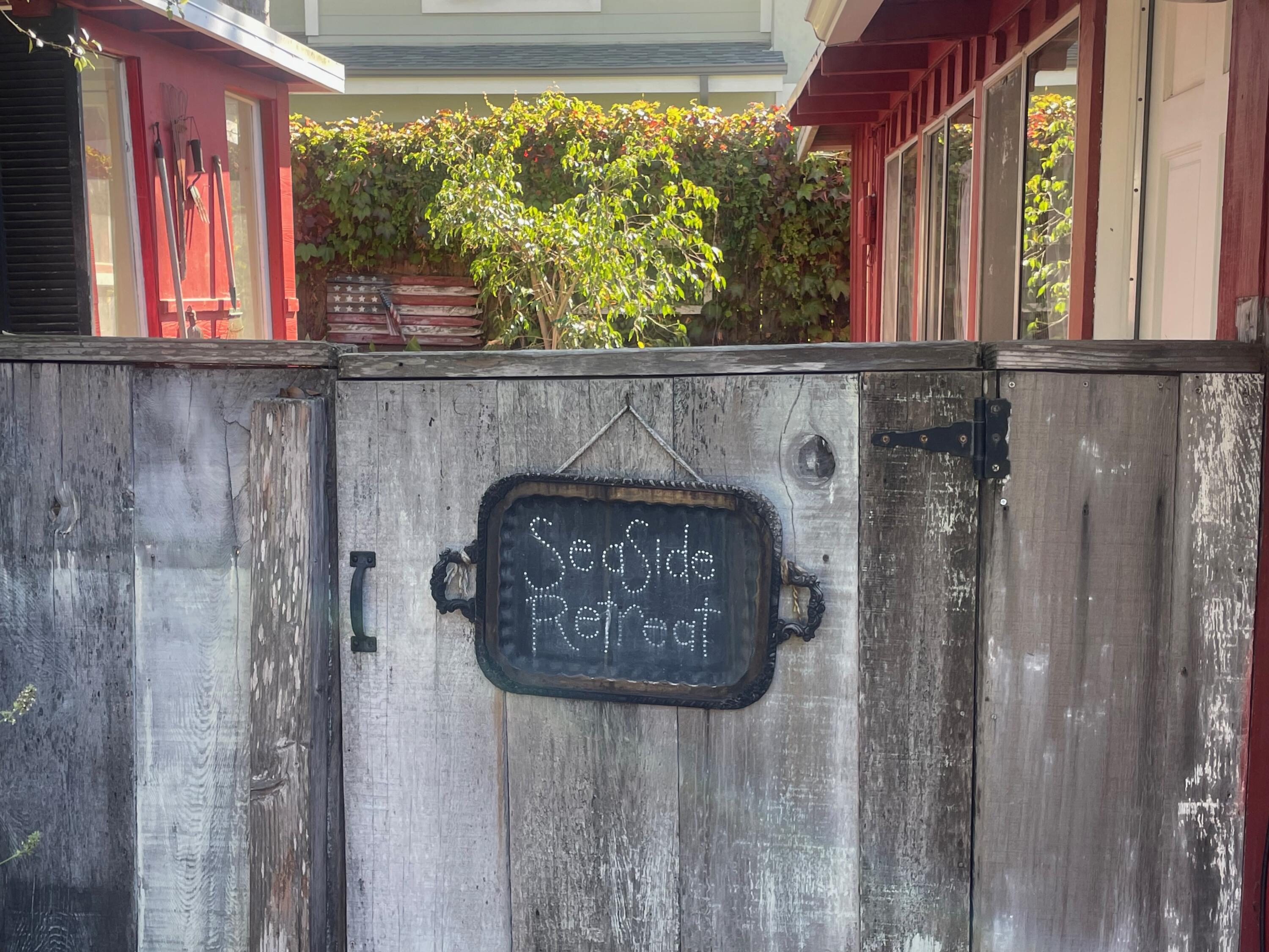 5161 6th Street Carpinteria, CA 93013 - Photo 15 of 27 a close view of fireplace and window