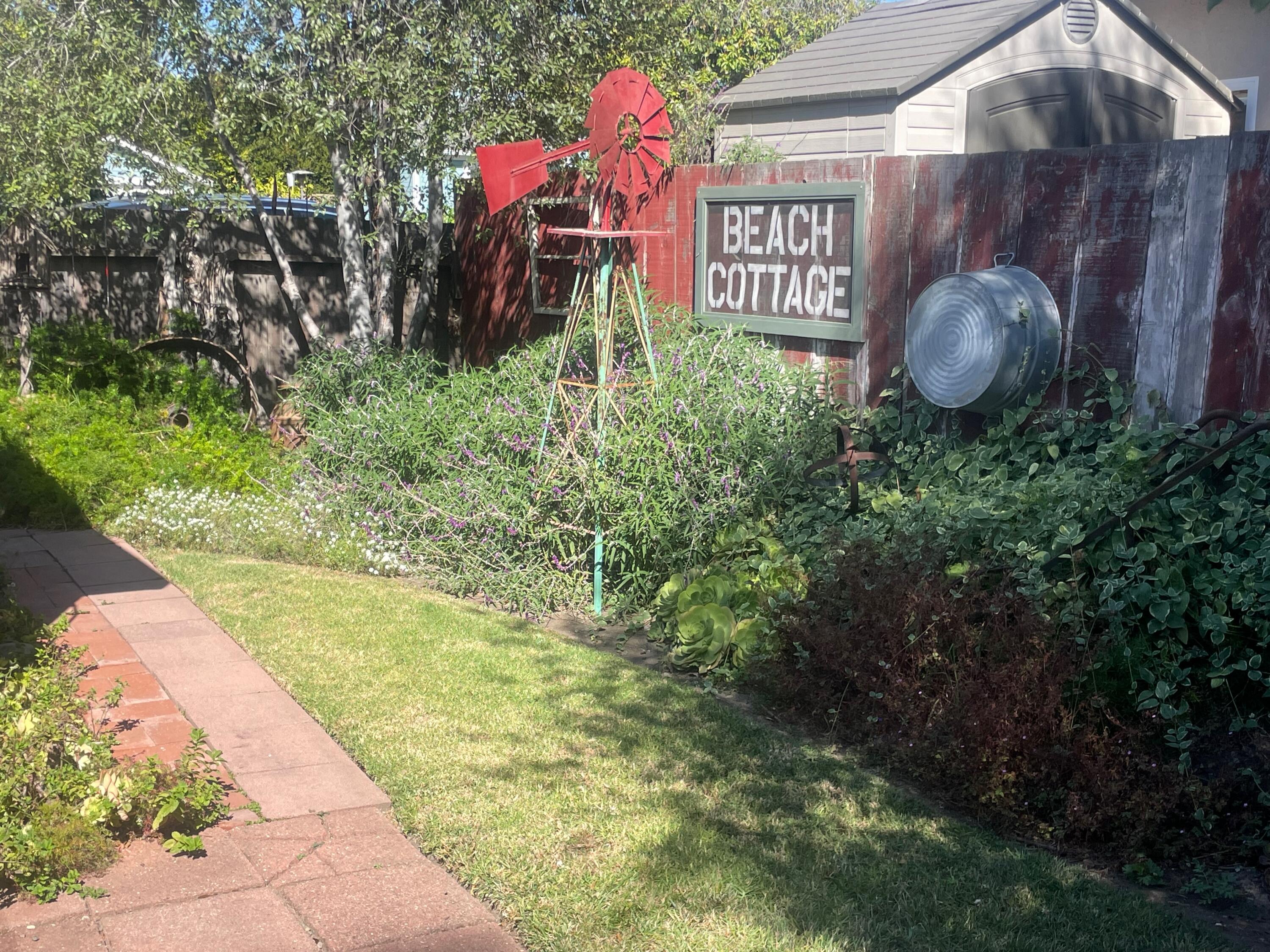 5161 6th Street Carpinteria, CA 93013 - Photo 16 of 27 a front view of a house with garden