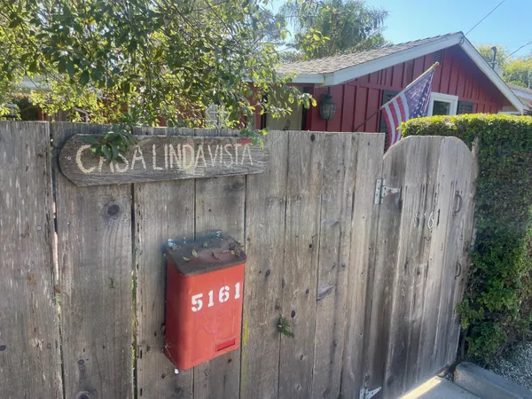 a view of a wooden fence