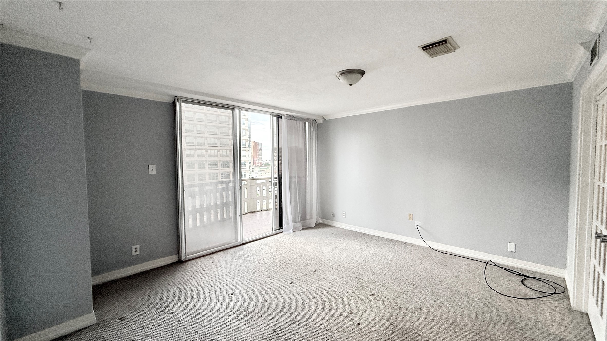 2016 Main Street, Unit 1113 Houston, TX 77002 - Photo 2 of 44 a view of an empty room with a window