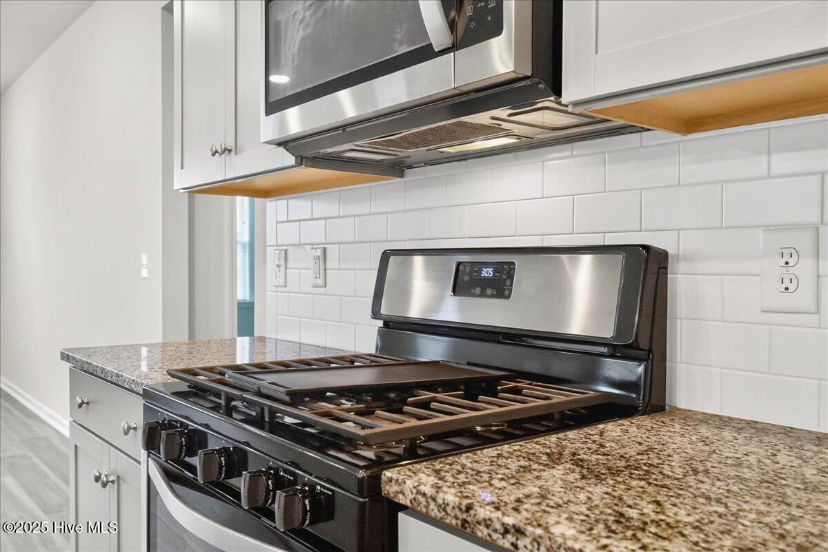 9355 Eagle Rdg Drive Calabash, NC 28467 - Photo 26 of 77 Stainless steel appliances with gas range.