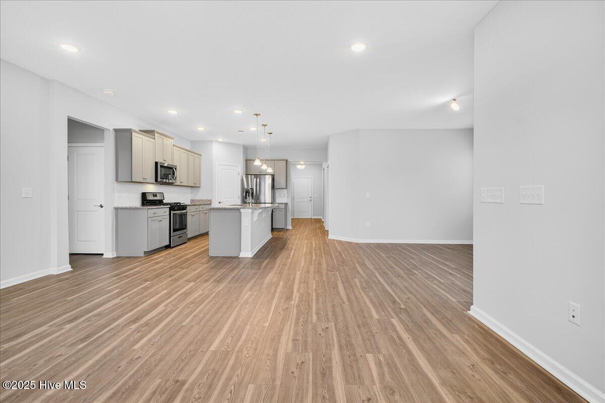 9355 Eagle Rdg Drive Calabash, NC 28467 - Photo 29 of 83 Living area with view of kitchen.