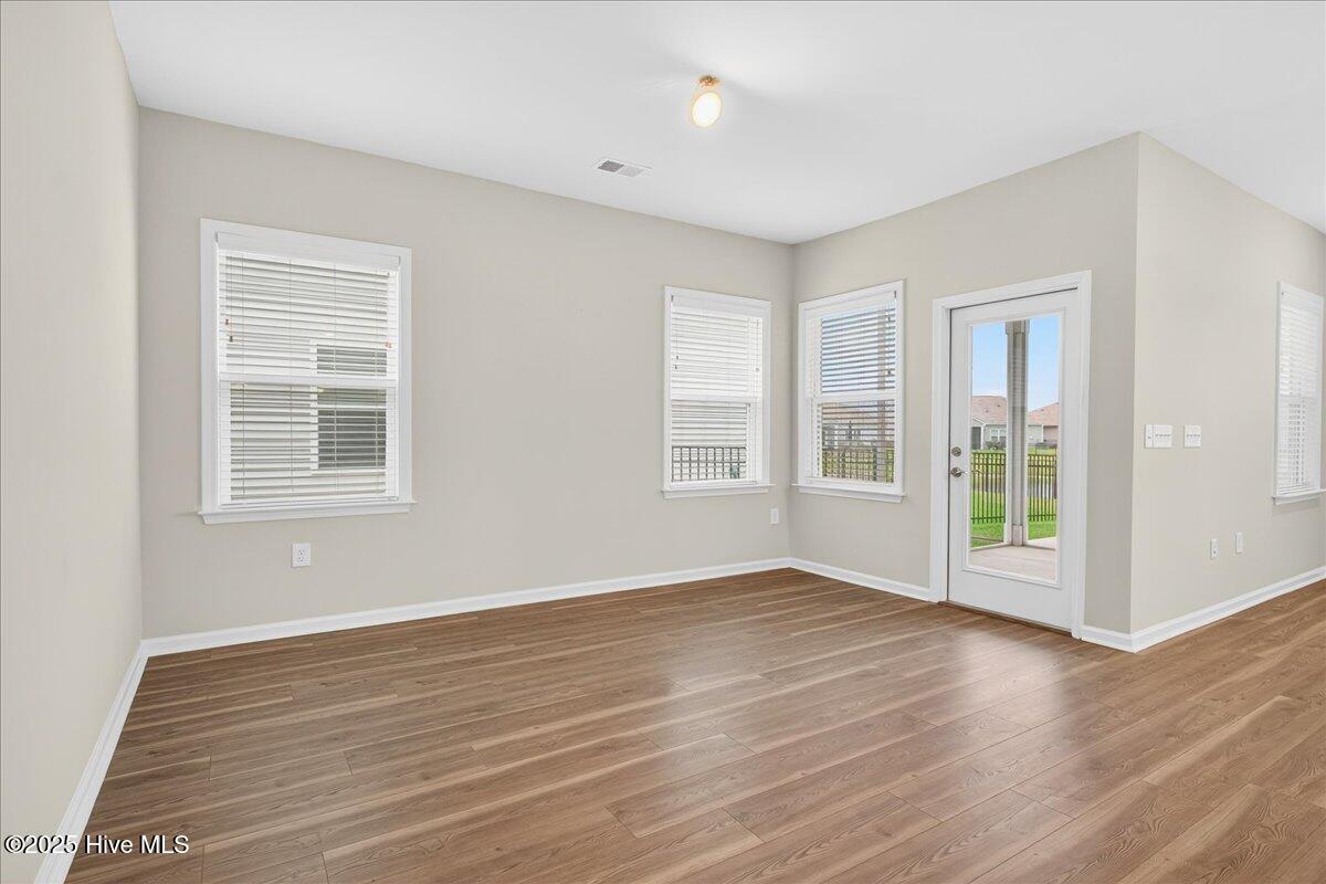 9355 Eagle Rdg Drive Calabash, NC 28467 - Photo 32 of 77 Dining nook with door to patio.
