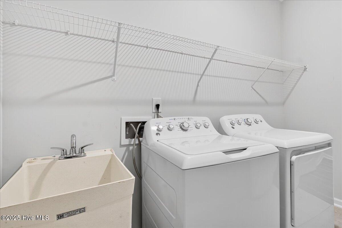 9355 Eagle Rdg Drive Calabash, NC 28467 - Photo 45 of 77 Laundry room featuring a utility sink.