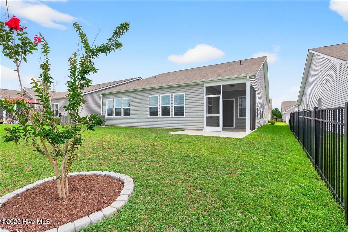 9355 Eagle Rdg Drive Calabash, NC 28467 - Photo 61 of 83 Back exterior of property.