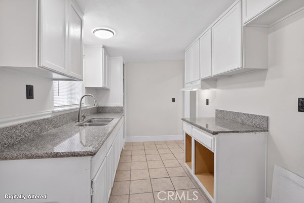 13391 Mesquite Road Whitewater, CA 92282 - Photo 21 of 27 a kitchen with granite countertop stainless steel appliances a sink stove and cabinets