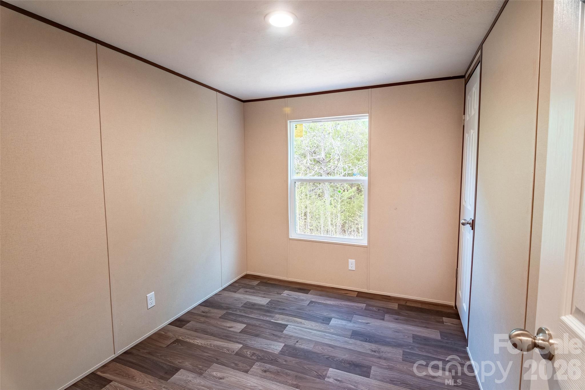 482 Jm Lovelace Road Ellenboro, NC 28040 - Photo 23 of 30 a view of an empty room with a window