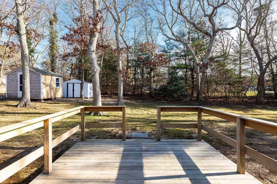6 Stage Coach Road Centerville, MA 02632 - Photo 19 of 29 a view of swimming pool with chairs