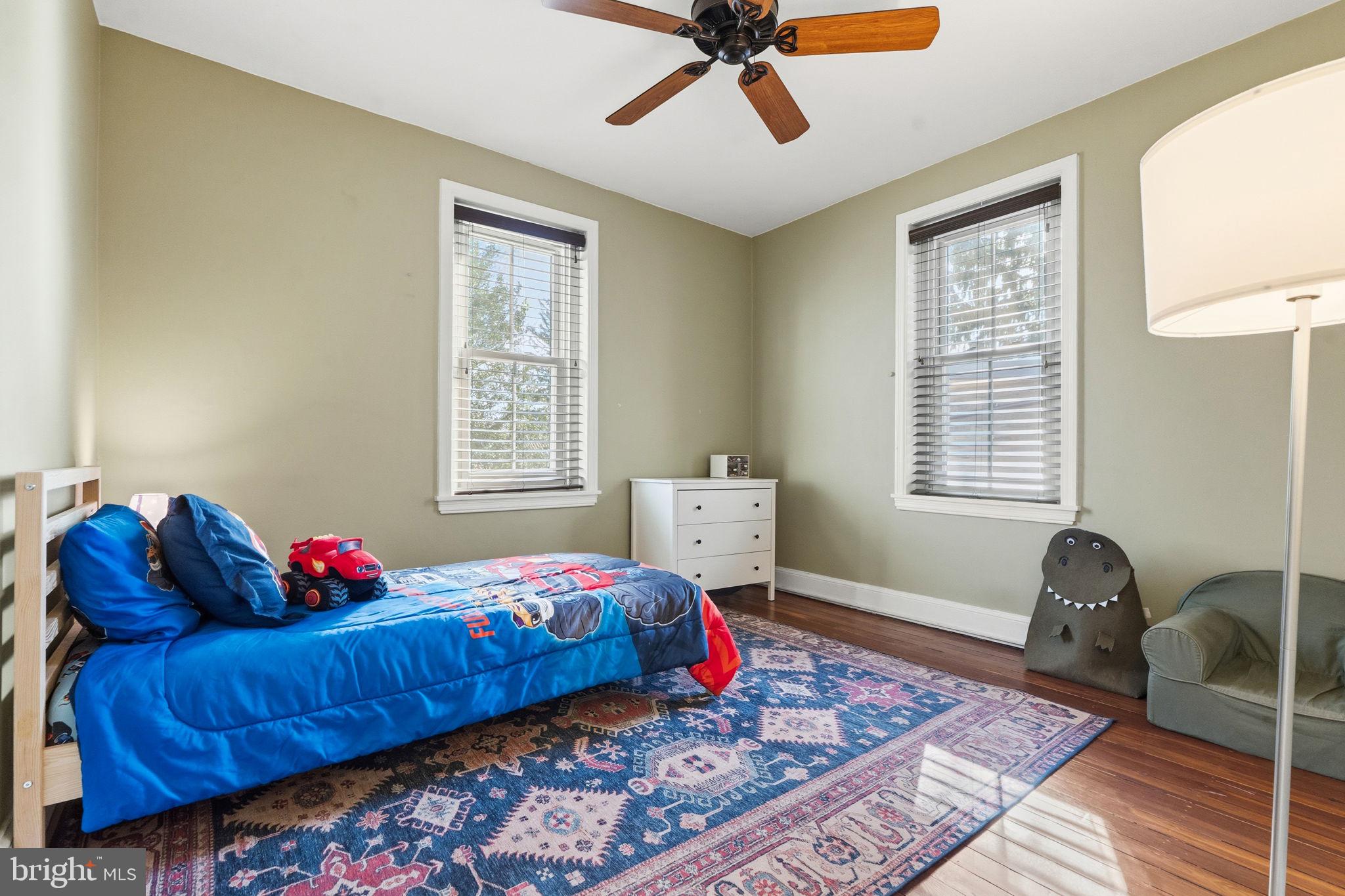 212 Benezet Street Philadelphia, PA 19118 - Photo 20 of 32 a bedroom with bed and a window
