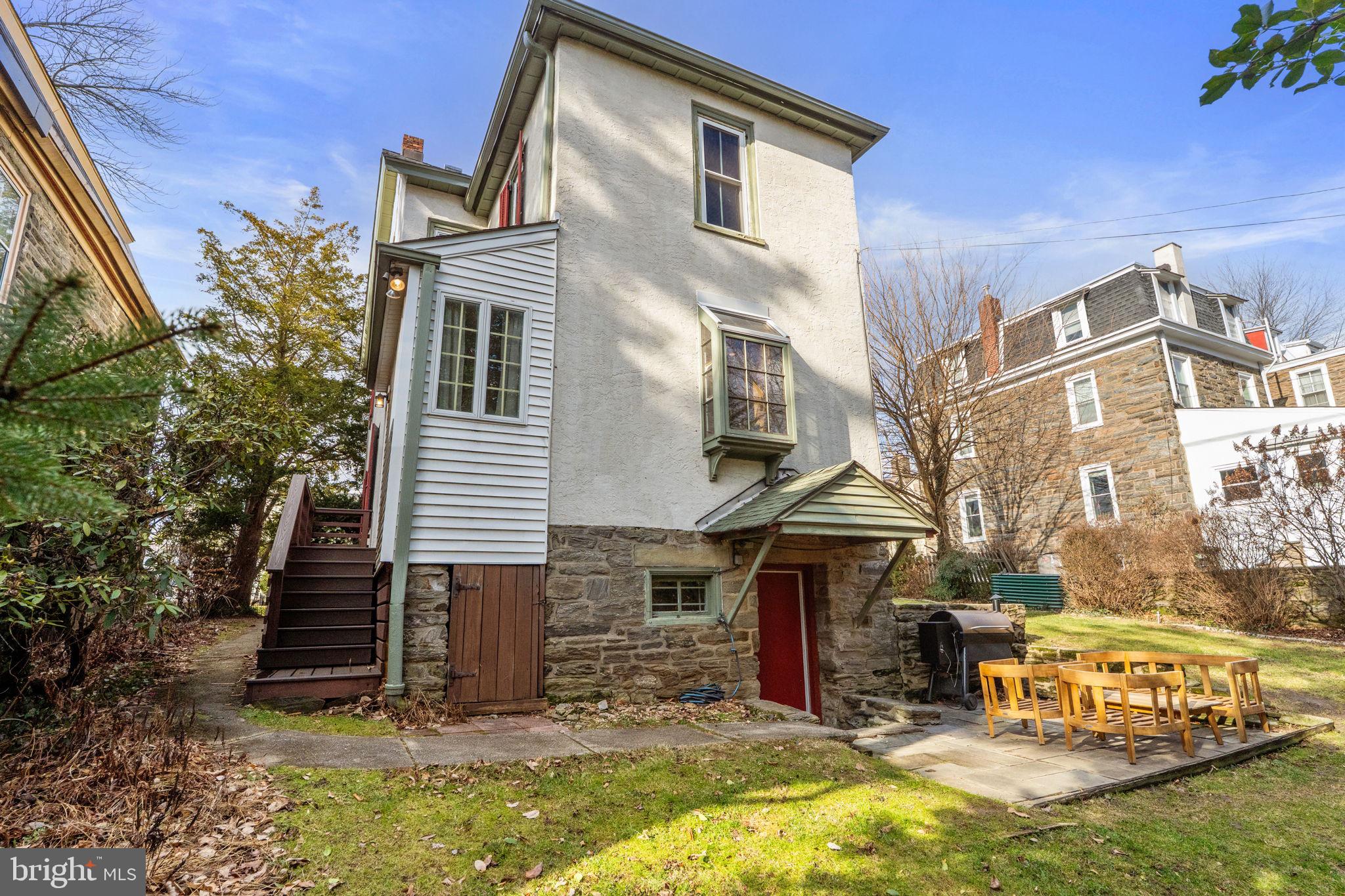 212 Benezet Street Philadelphia, PA 19118 - Photo 28 of 32 a view of a house with wooden fence