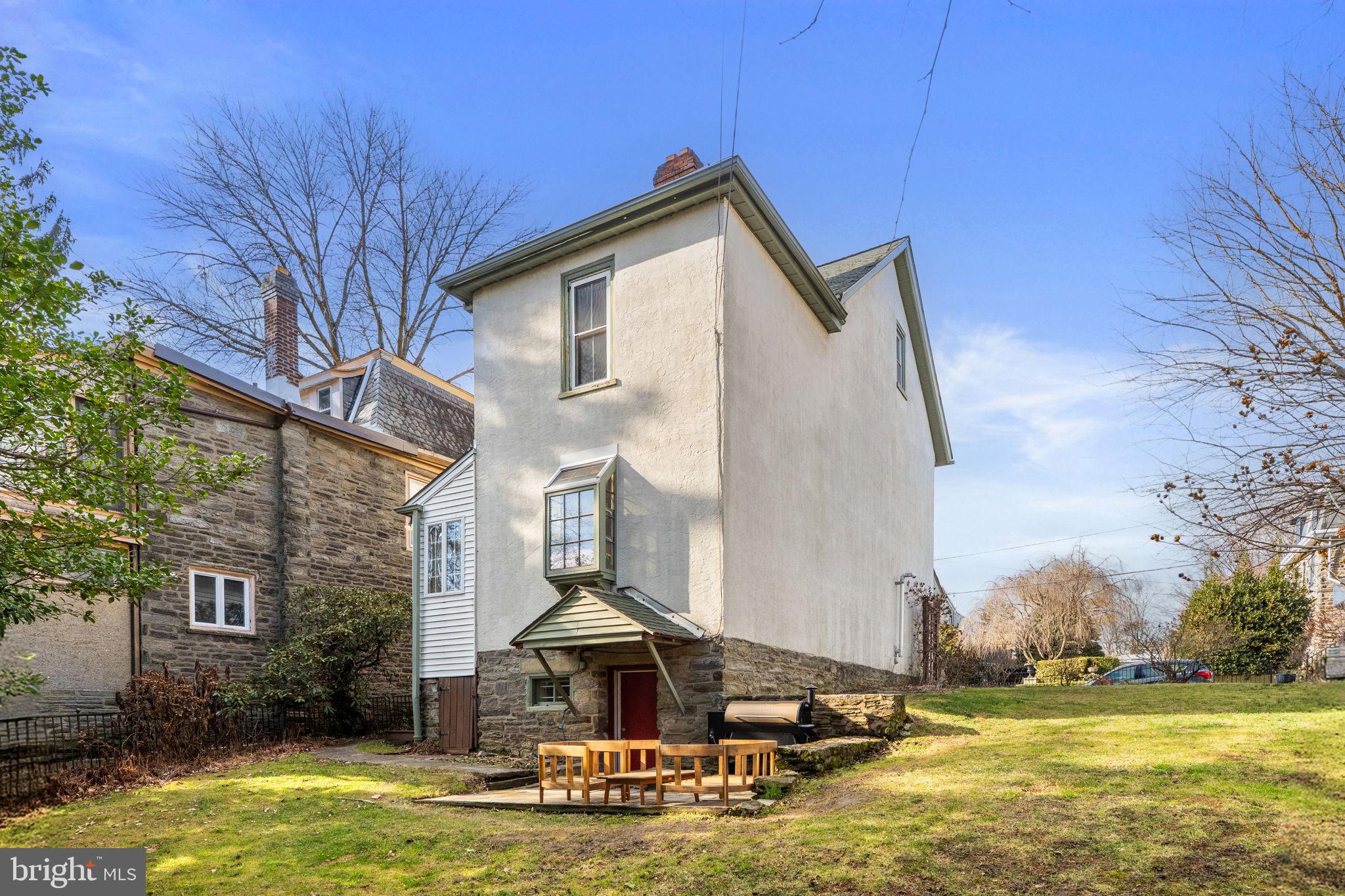 212 Benezet Street Philadelphia, PA 19118 - Photo 31 of 32 a view of a house with pool and sitting area