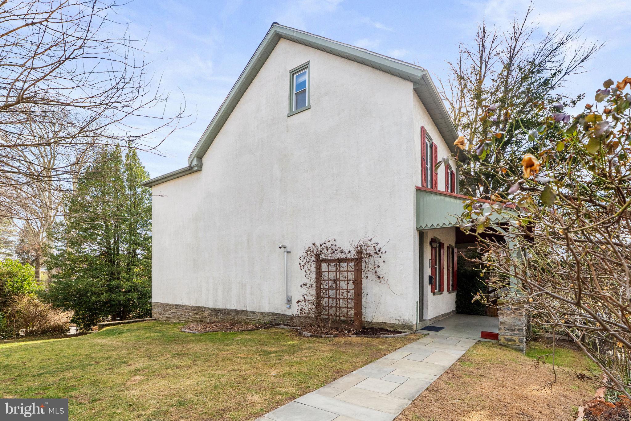 212 Benezet Street Philadelphia, PA 19118 - Photo 32 of 32 a view of a house with a yard