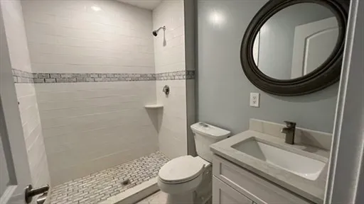 a bathroom with a toilet and a sink