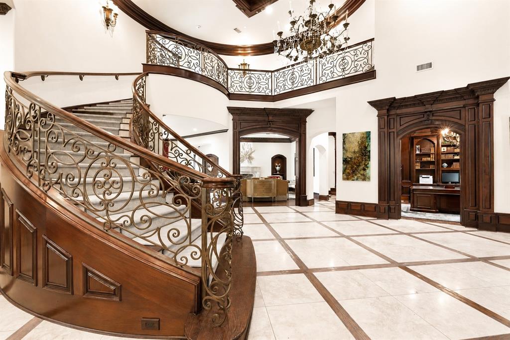 6413 Old Gate Road Plano, TX 75024 - Photo 11 of 39 Elegant luxury foyer with curved staircase