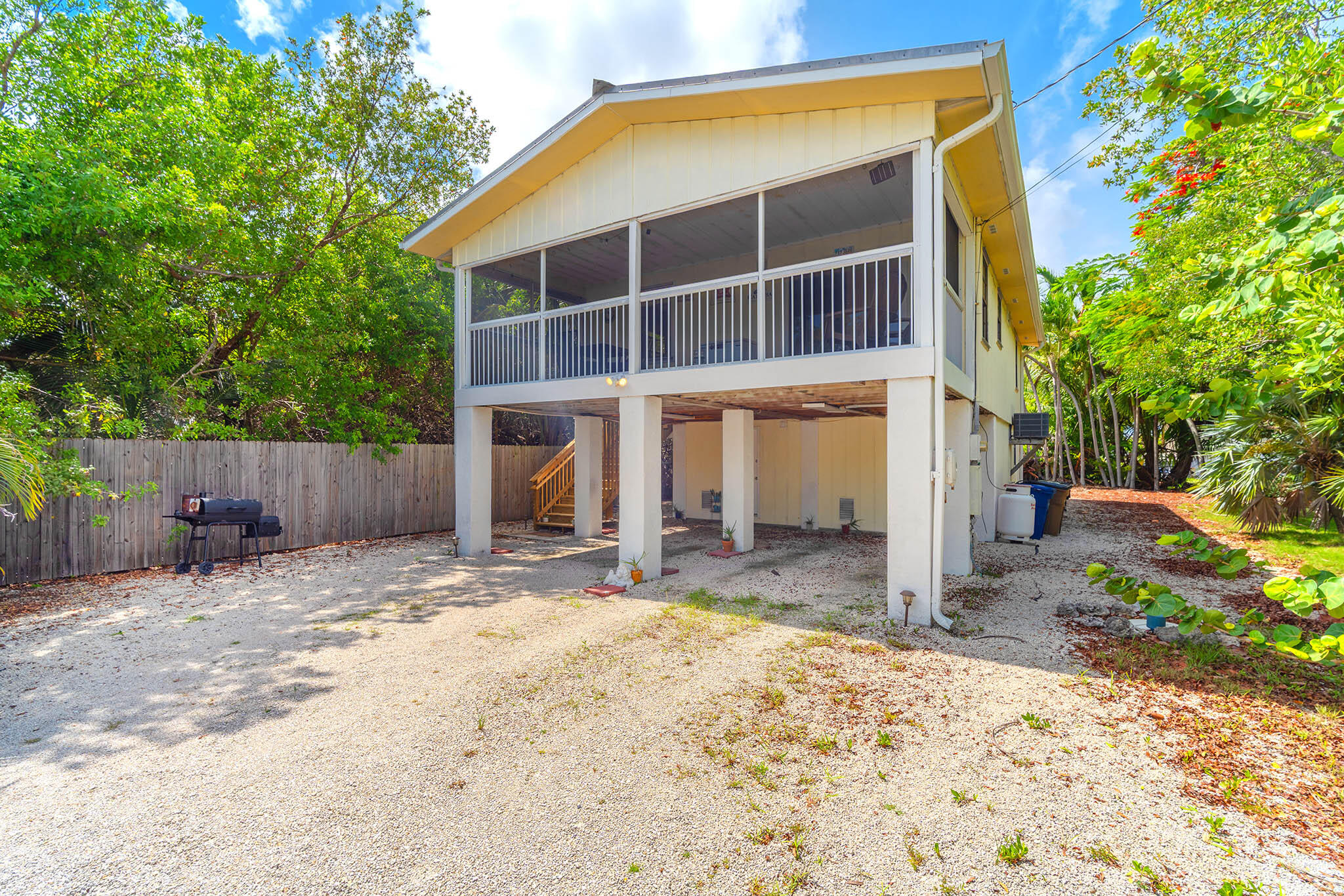 29951 Pine Channel Road Big Pine Key, FL 33043 - Photo 51 of 61 a view of a house with backyard and sitting area