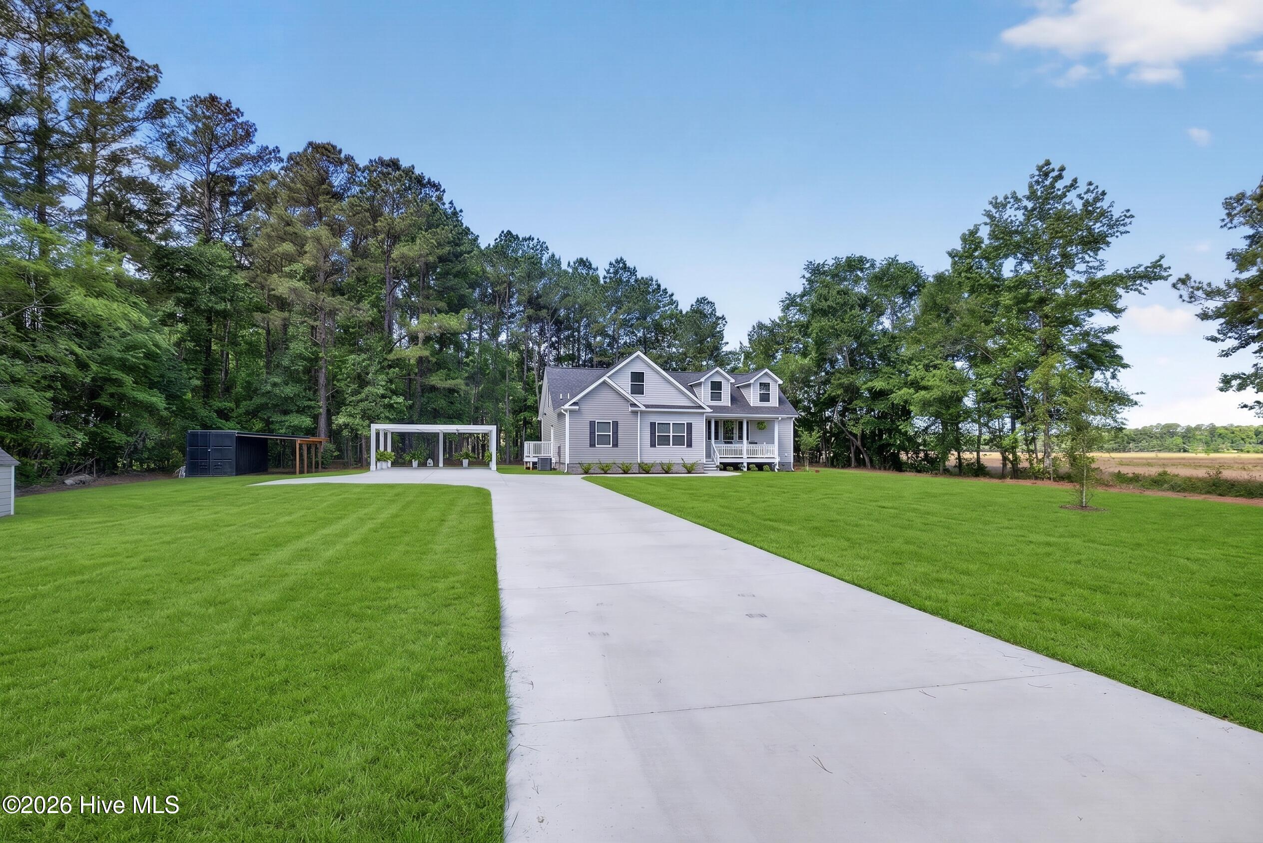 451 Governors Road Southeast Winnabow, NC 28479 - Photo 1 of 60 451GovernorsRoadSE-1_Digital_Lawn_Repair