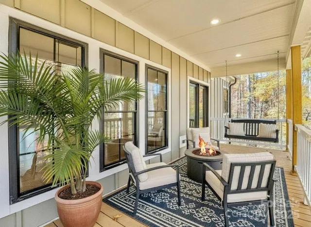 a view of a room with wooden walls