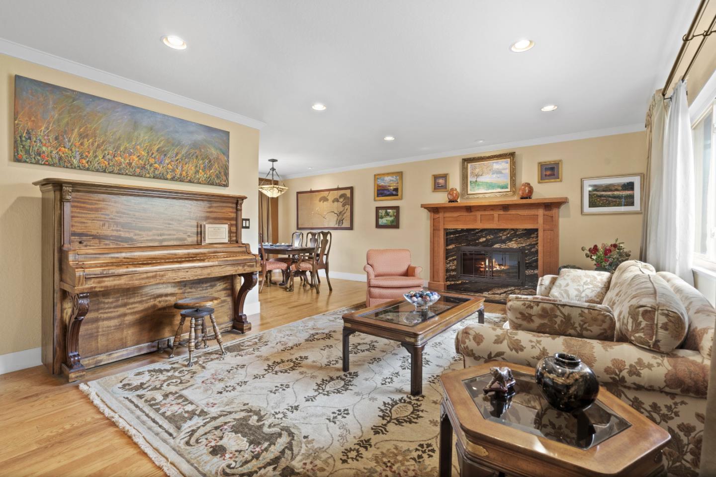 2841 Pruneridge Avenue Santa Clara, CA 95051 - Photo 11 of 53 a living room with furniture and a fireplace
