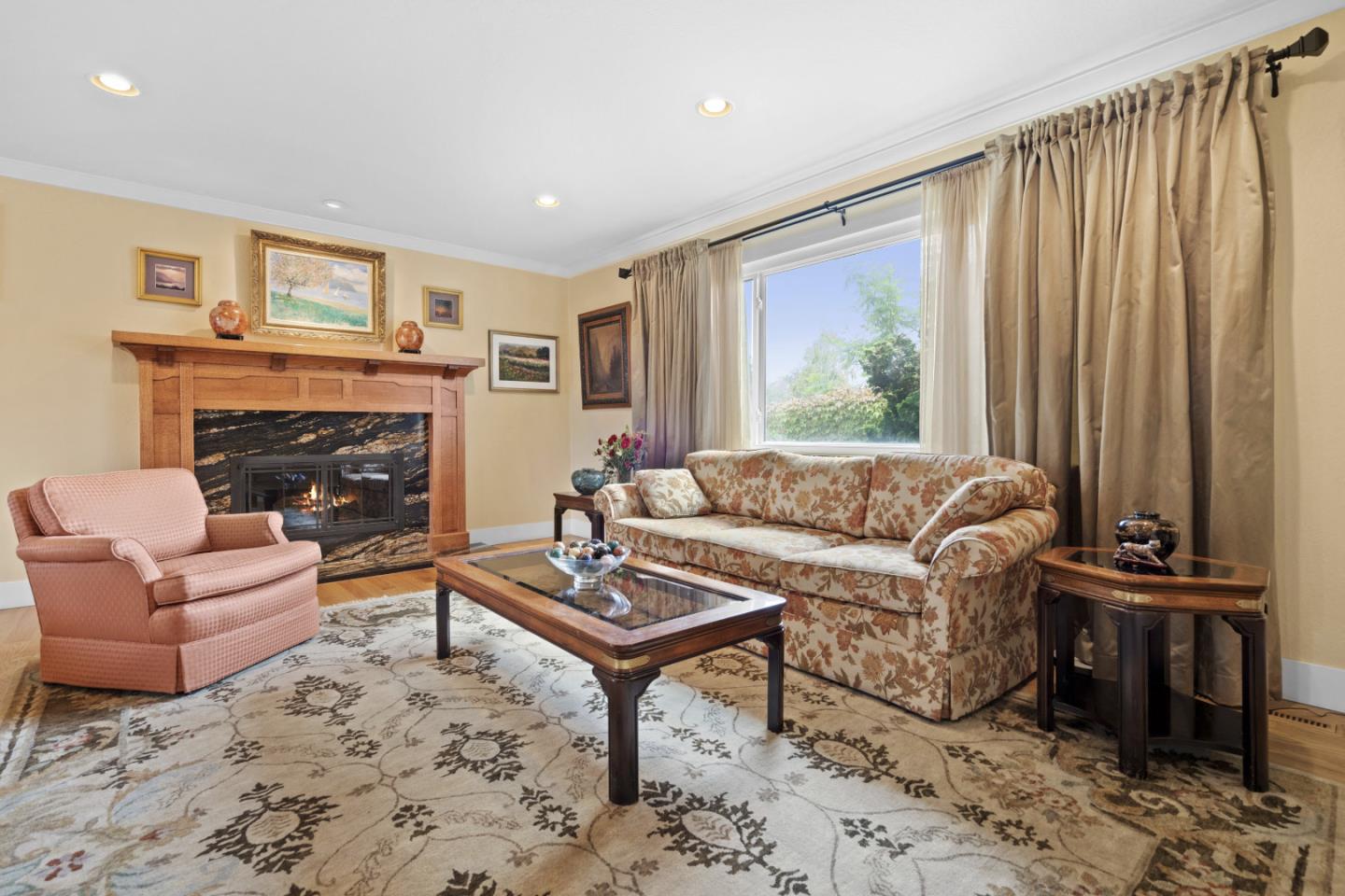 2841 Pruneridge Avenue Santa Clara, CA 95051 - Photo 12 of 53 a living room with furniture a fireplace and a flat screen tv
