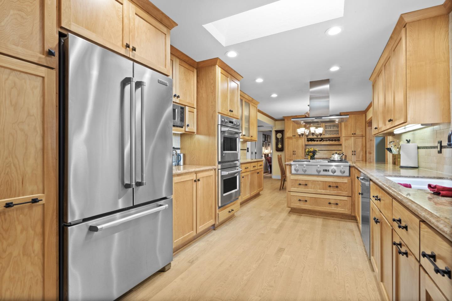 2841 Pruneridge Avenue Santa Clara, CA 95051 - Photo 16 of 53 a kitchen with stainless steel appliances a refrigerator sink and cabinets