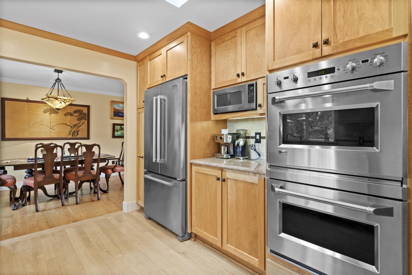 2841 Pruneridge Avenue Santa Clara, CA 95051 - Photo 17 of 53 a kitchen with stainless steel appliances a stove microwave and refrigerator