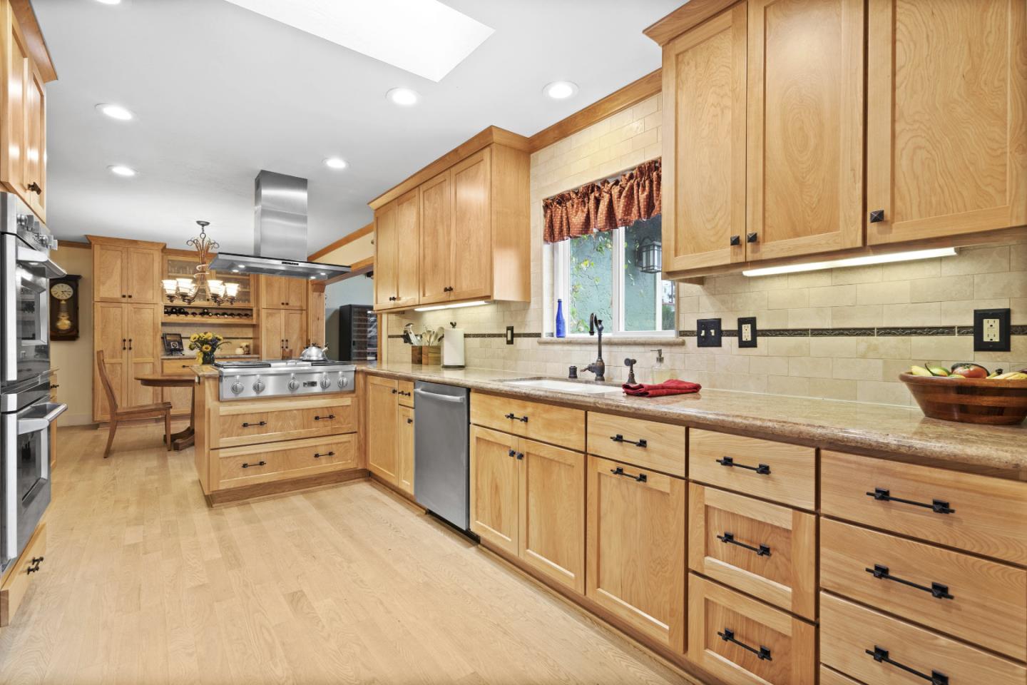 2841 Pruneridge Avenue Santa Clara, CA 95051 - Photo 18 of 53 a kitchen with cabinets oven and a sink