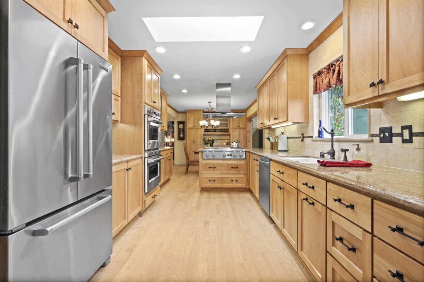 2841 Pruneridge Avenue Santa Clara, CA 95051 - Photo 20 of 53 a kitchen with stainless steel appliances sink refrigerator and microwave