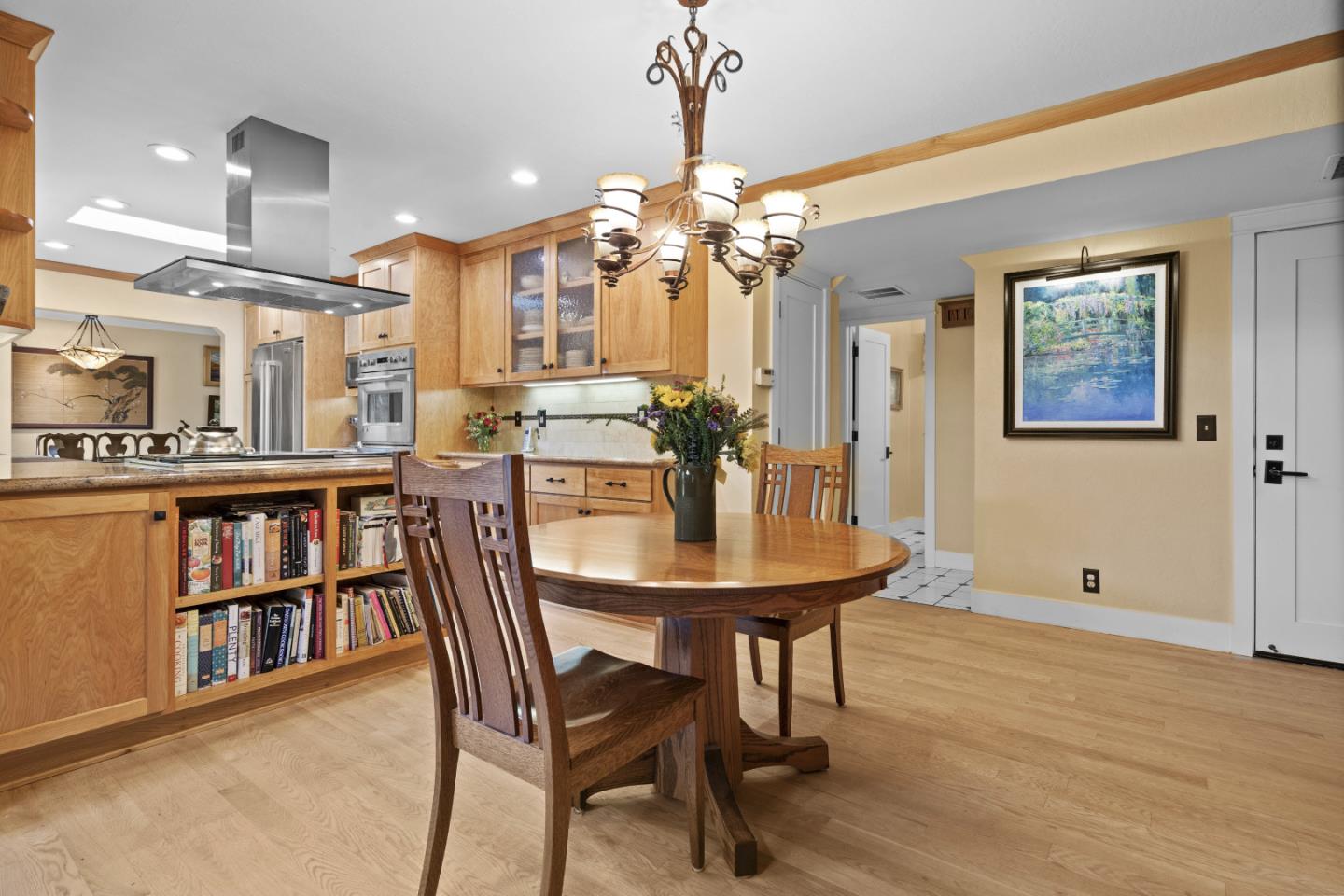 2841 Pruneridge Avenue Santa Clara, CA 95051 - Photo 22 of 53 a view of a a dining room with furniture and a chandelier