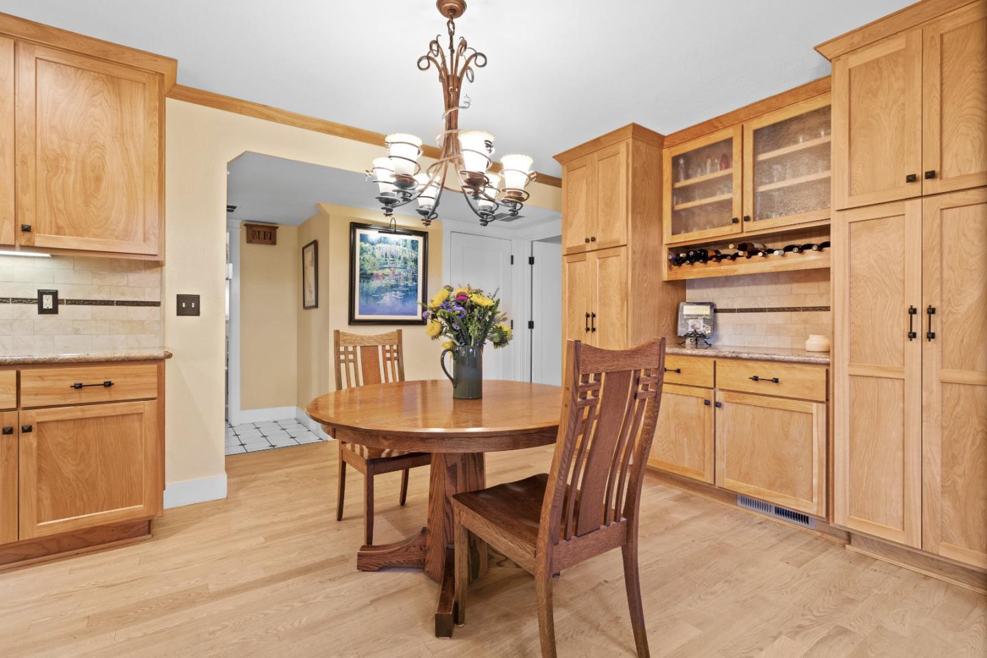2841 Pruneridge Avenue Santa Clara, CA 95051 - Photo 24 of 53 a view of a dining room with furniture and chandelier