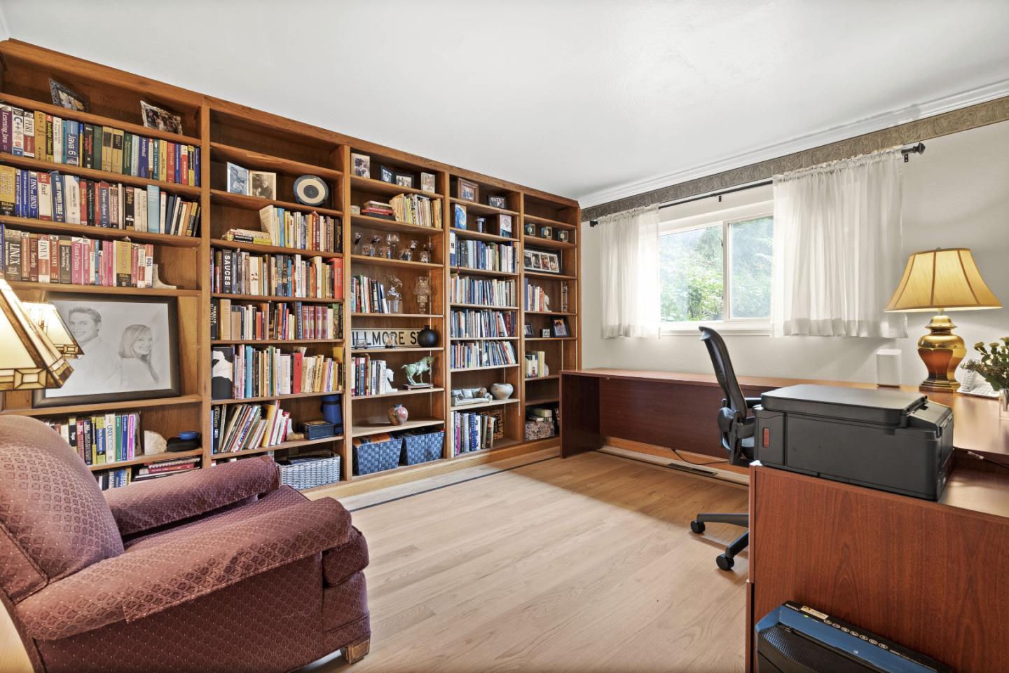 2841 Pruneridge Avenue Santa Clara, CA 95051 - Photo 25 of 53 a living room with furniture and a book shelf