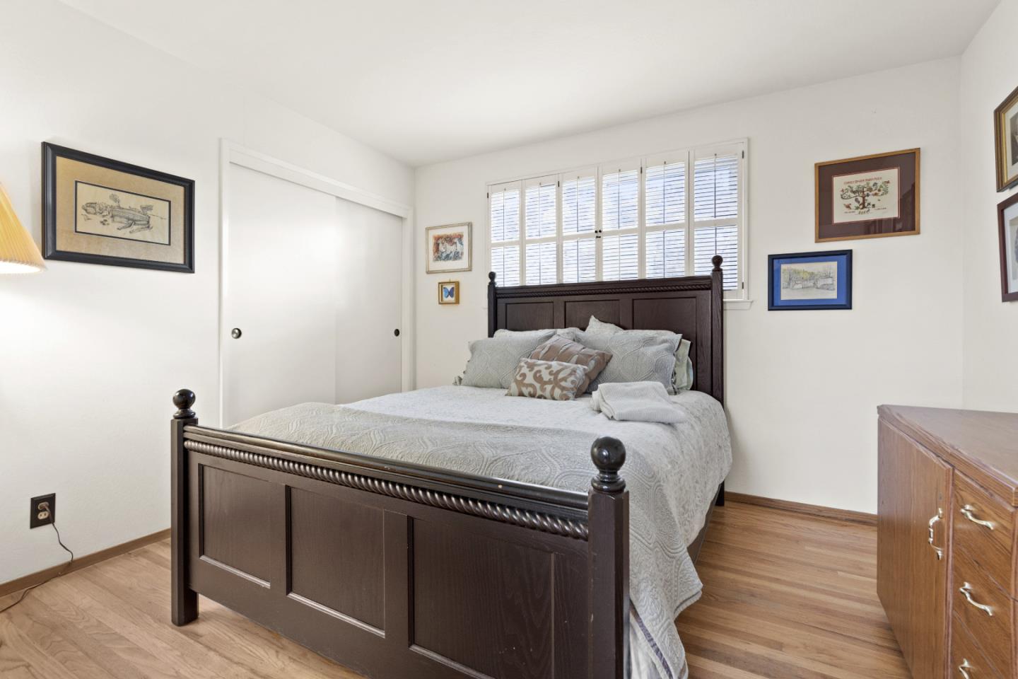 2841 Pruneridge Avenue Santa Clara, CA 95051 - Photo 42 of 53 a bed sitting in a bedroom next to a window