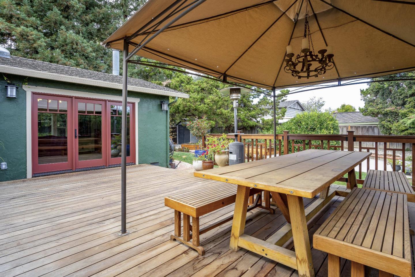 2841 Pruneridge Avenue Santa Clara, CA 95051 - Photo 44 of 53 a patio with wooden floor a yard a table and chairs