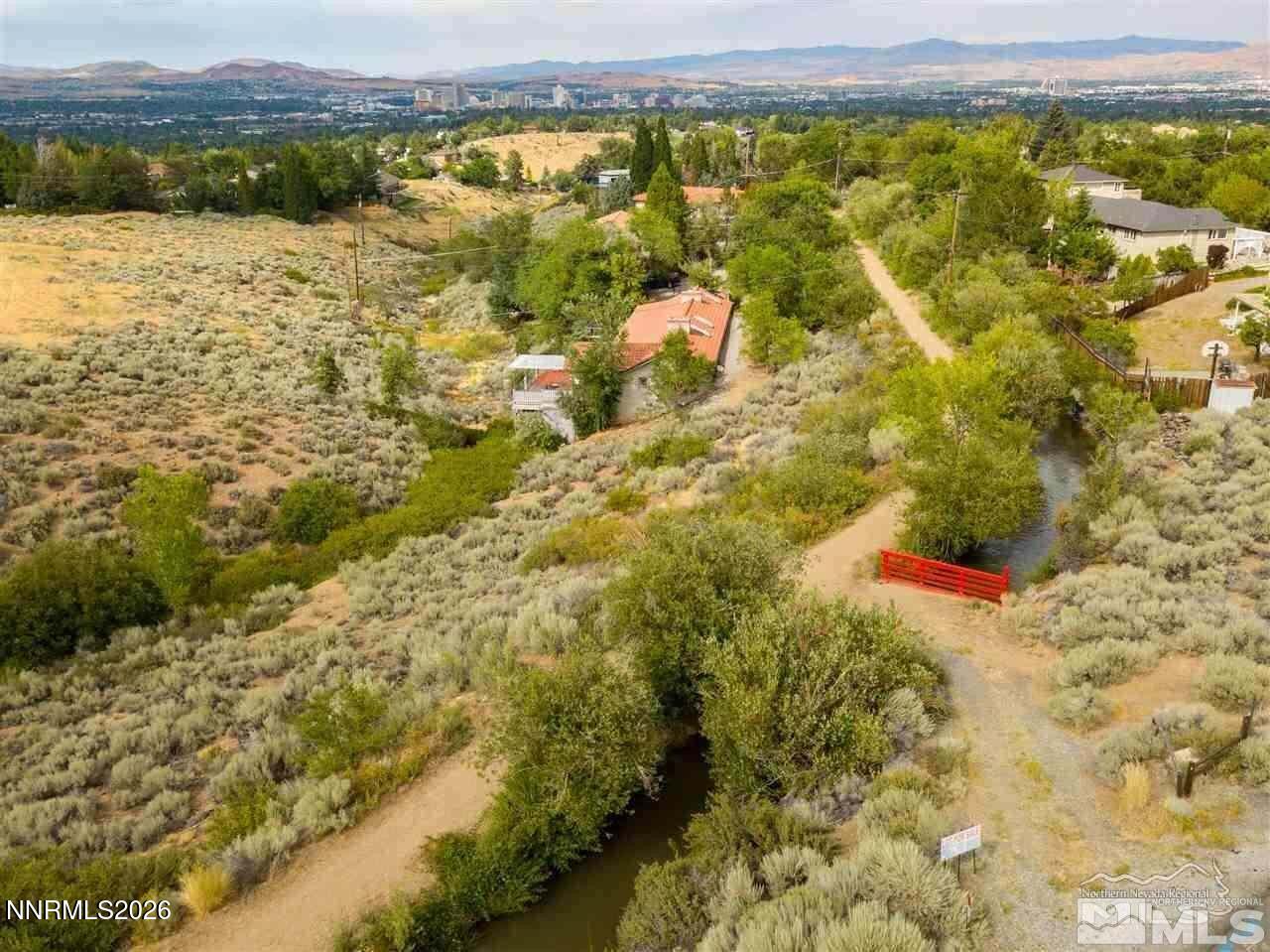 3245 Markridge Drive, Unit 9 Reno, NV 89509 - Photo 3 of 11 a view of an outdoor space and a lake view
