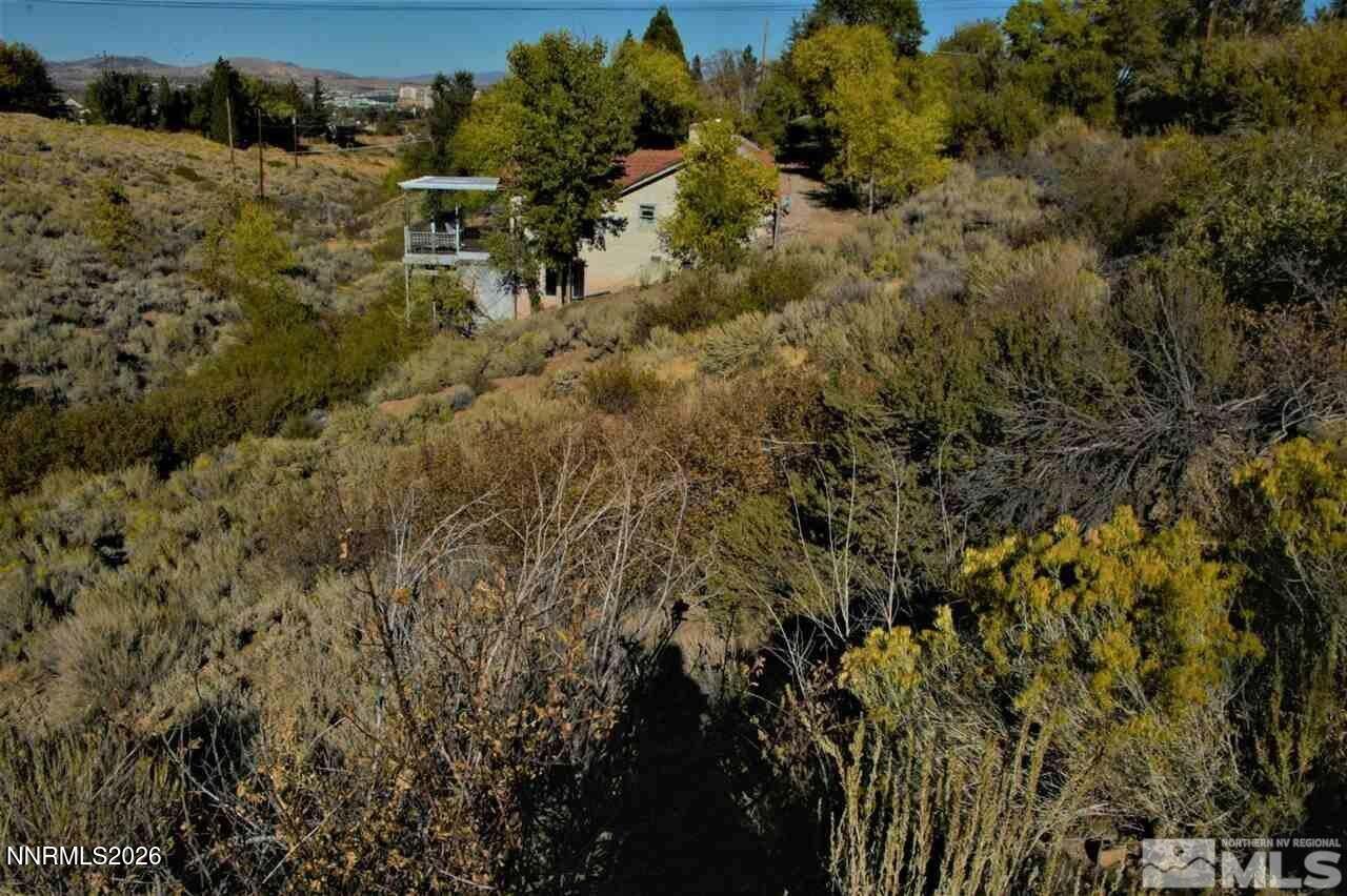 3245 Markridge Drive, Unit 9 Reno, NV 89509 - Photo 6 of 11 a view of a yard