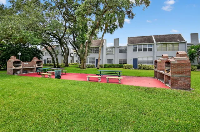 a house view with a garden space
