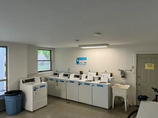 a view of a kitchen with appliances and a window