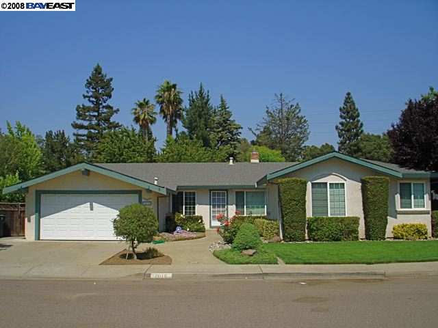 2076 Mars Road Livermore, CA 94550 - Photo 1 of 1 a front view of a house with a yard and garage
