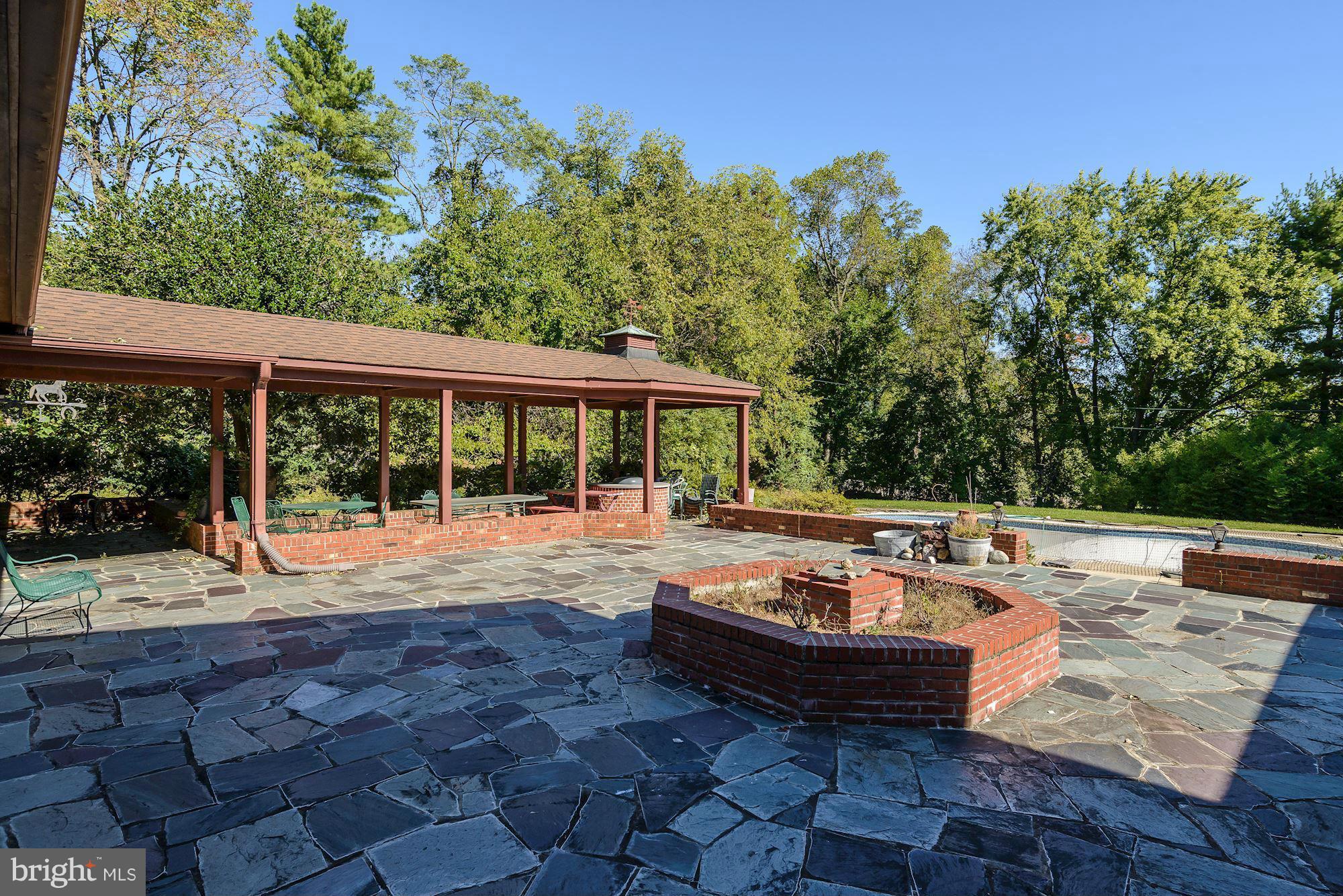 9401 Persimmon Tree Road Potomac, MD 20854 - Photo 3 of 18 Exterior (Rear)