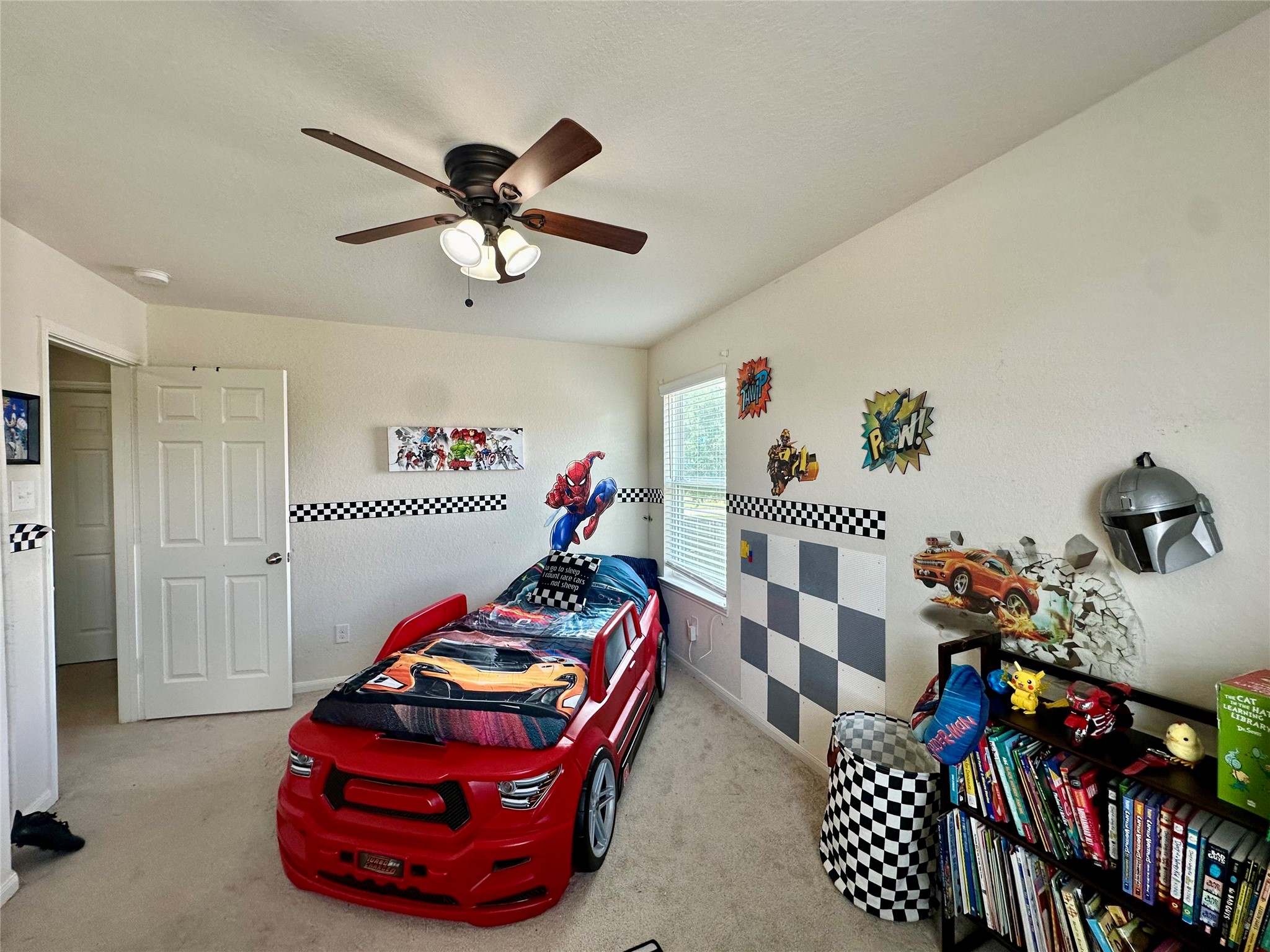 18622 Each Elm Way Houston, TX 77084 - Photo 29 of 35 a bedroom with furniture a rug and a chandelier