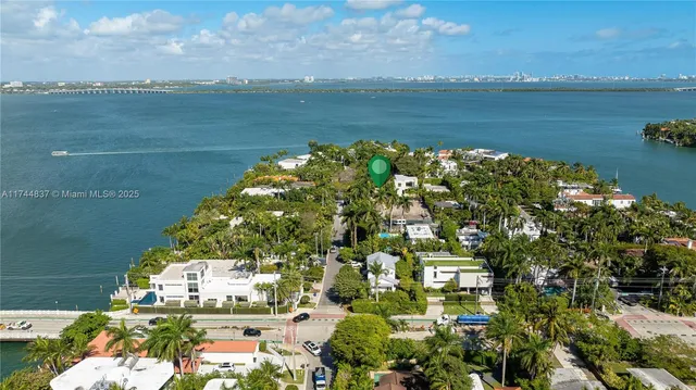 an aerial view of a houses with outdoor space