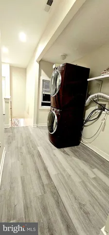 a bedroom with a bed and cabinets