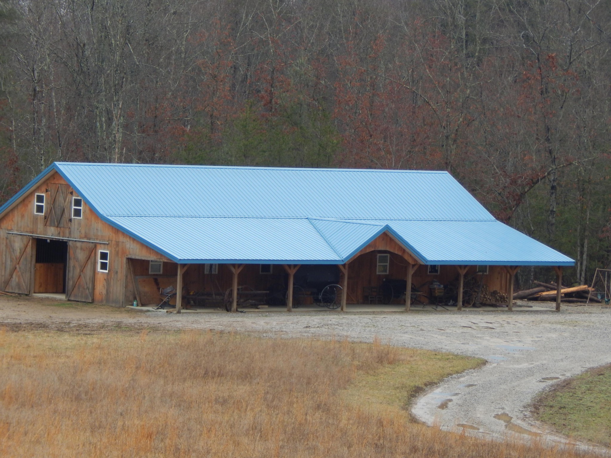 539 Glades Road Sunbright, TN 37872 - Photo 6 of 28 a front view of a house with a yard and garage