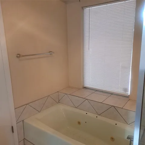 a bathroom with a bathtub