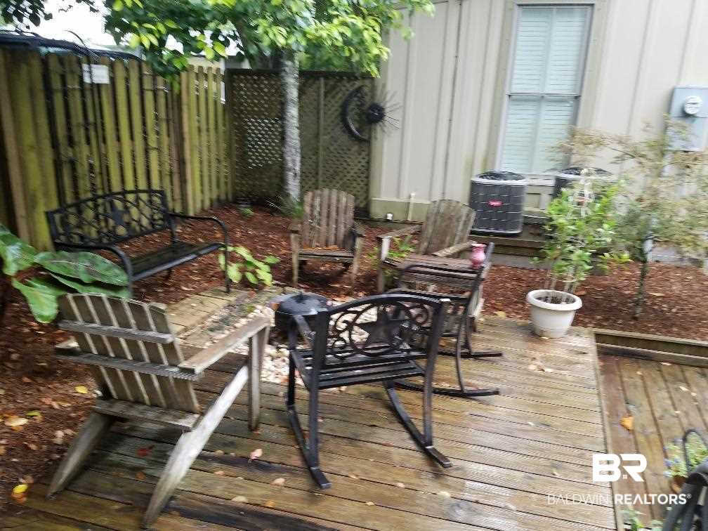 25773 Canal Road, Unit 41 Orange Beach, AL 36561 - Photo 22 of 34 Enjoy the fire pit and outdoor living space