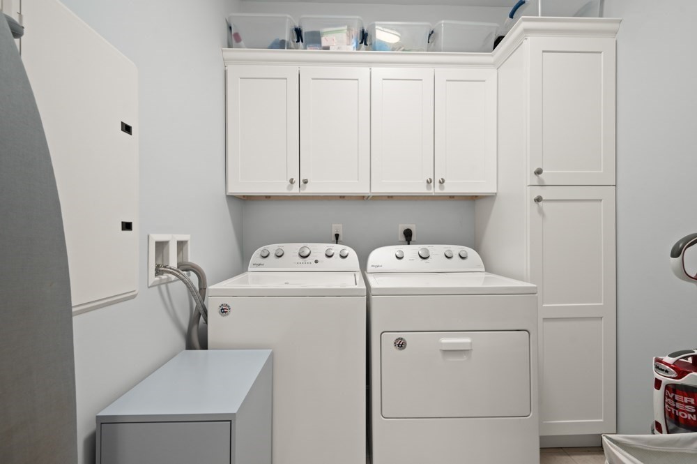 57 Augustus Court, Unit 1010 Reading, MA 01867 - Photo 26 of 32 a utility room with dryer and washer