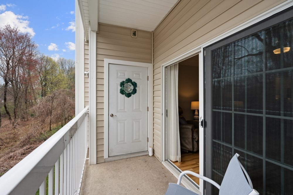 57 Augustus Court, Unit 1010 Reading, MA 01867 - Photo 28 of 32 a view of balcony